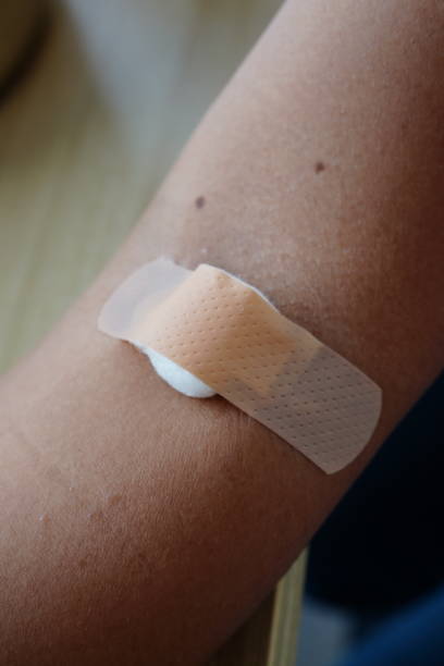 istock Medical plaster on arm after taking venipuncture 1444971079