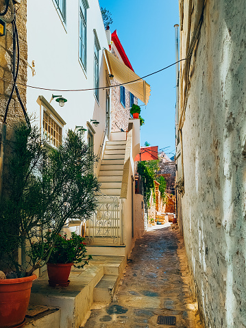 Traditional cobbled alley in Hydra, Greece.