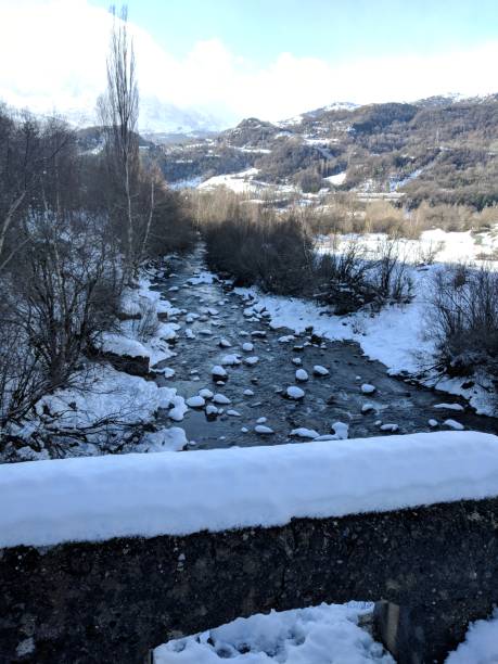 Winter landscape with a view of a snowy mountain stock photo