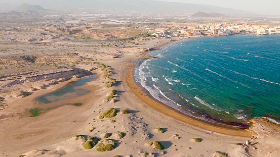 Drone view of Wind and Kite Surfers at El Medano, Tenerife