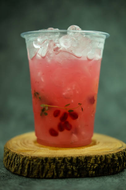 istock Glass with a chilled pink drink. 1444974916