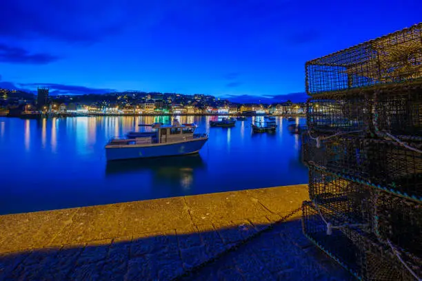 Photo of Evening view of lobster traps and the harbor, St Ives