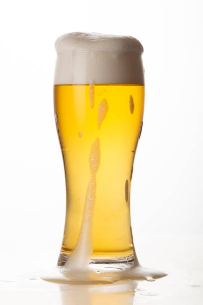 istock Glass of light beer isolated on white background 1444975804