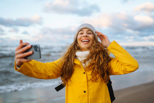 istock Young tourist with phone. Selfie time. 1444976362