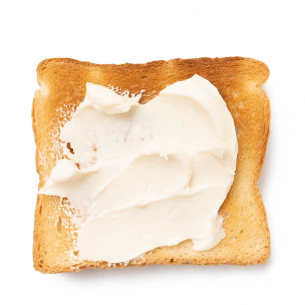 istock fresh toast with cream cheese on white 1444977870