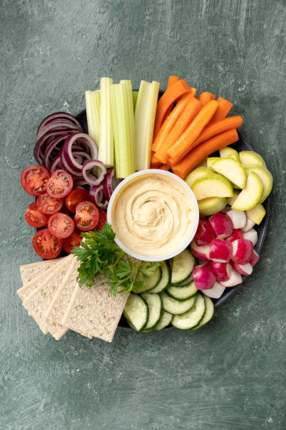istock Healthy snack chickpea hummus with vegetables 1444978334