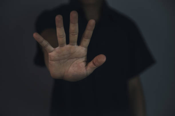 istock Male hand showing stop violence gesture. Warning, Prohibition, Denial. 1444978890