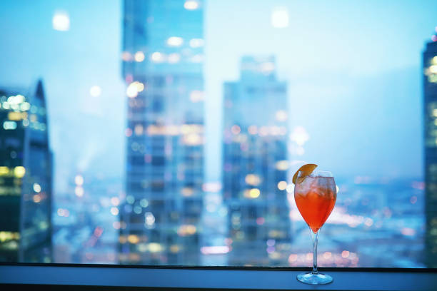 istock Cocktail glasses on the windowsill by the glass 1444979512