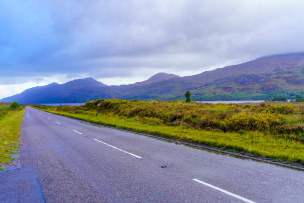 istock Road along the Loch Maree, in Wester Ros 1444981173