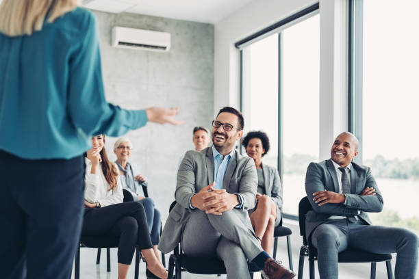 istock Mixed group of business persons attending a conference 1444981715