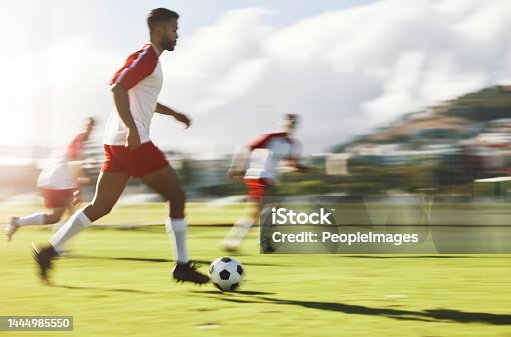 istock Soccer, team training and men sports game teamwork competition on field. Healthy football collaboration, running fitness workout and athlete sport lifestyle with runner players and ball on grass 1444985550