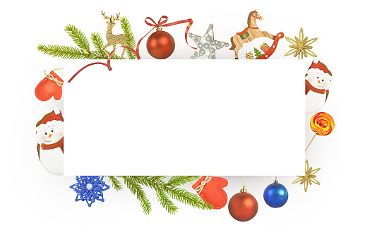 Christmas card with a copy space and decor of fir branches, candy and Christmas toys on a white background