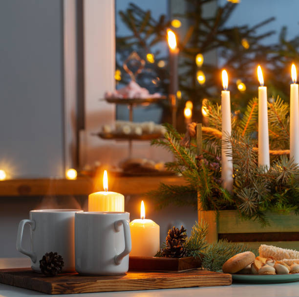 istock white cups with hot drink and christmas decorations at home 1444985713