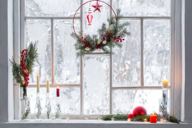 Photo of christmas decor on background old wooden  window