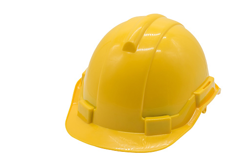 Yellow hard hat isolated on white background. Heavy construction industry concept.