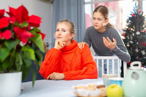 istock Daughter consoles mother 1444994347