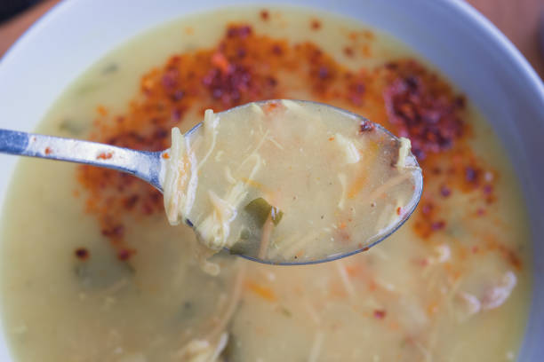 istock A spoonful of chicken soup with vegetables 1444997395