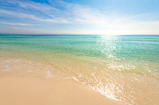 istock Shiny glitter shimmer waves with sun reflections on Gulf of Mexico ocean water with small ripples on sunny day at city of Miramar, Florida panhandle 1444999298