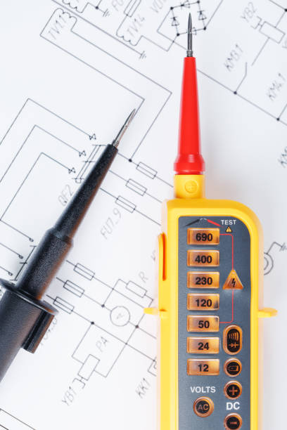 istock Yellow voltage indicator in close-up on the electrical diagram 1444999565