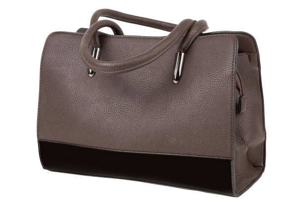 Brown women's bag with a black insert and two handles, on a white background, isolate