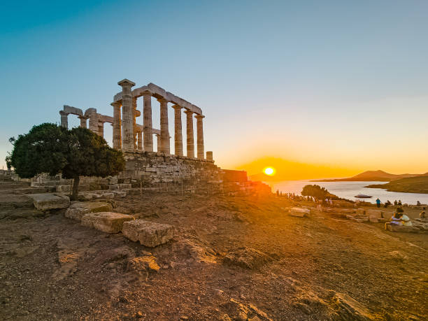 istock Watching the Sunset at the Temple of Poseidon 1445002328