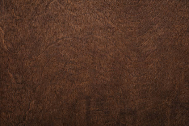 istock brown boards as a template for design. dark wood texture backdrop 1445005500