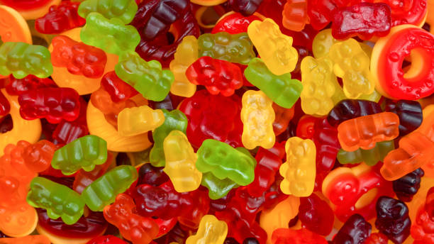 istock Assorted colorful gummy candies. Jelly donuts. Jelly bears. 1445006840