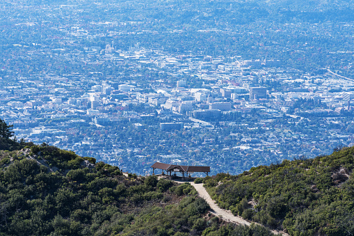 View of Inspiration Point and downtown Pasadena from the Mt Lowe hiking trail in the Angeles National Forest and San Gabriel Mountains area of Los Angeles County, California.