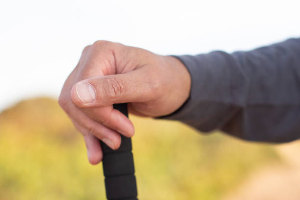 istock Close-up of hand with walking pole 1445009952