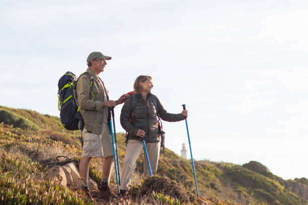 istock Happy elderly family hiking on summer 1445010031