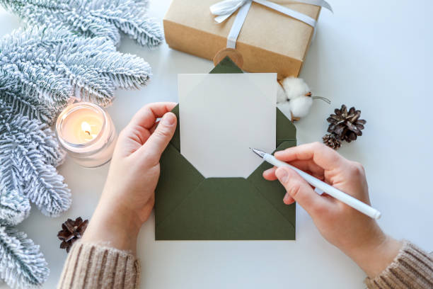 istock Congratulatory letter with place for text in hands. Place for your text 1445011321