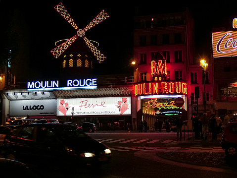 Paris, France - October 16, 2005: Boulevard Clichy. Moulin Rouge in the evening lights.