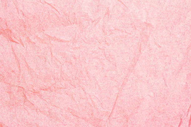 istock Crumpled pink crepe paper texture, pastel background 1445013585