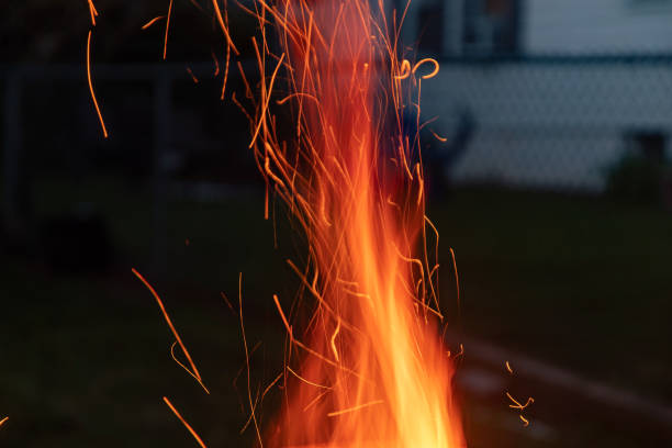 istock Sparks and Embers fly off the fire at dusk 1445013796