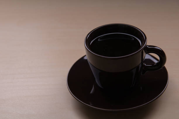 istock photo cup on a saucer 1445014340