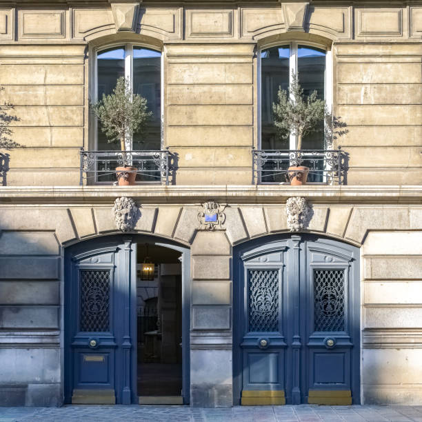 Paris, two ancient wooden doors, beautiful facade