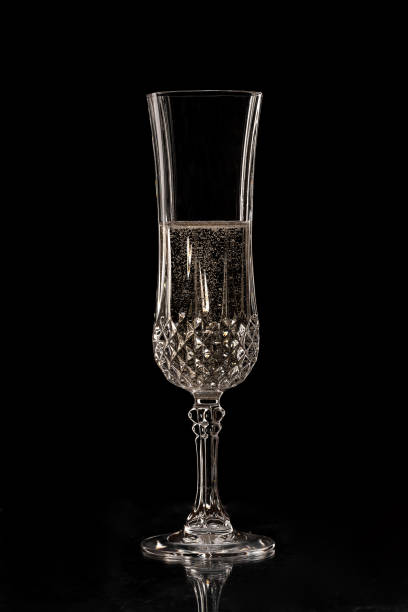 istock crystal champagne glass on black background 1445015418