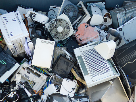 Electronic waste at a collection center for subsequent recycling. Circular economy.