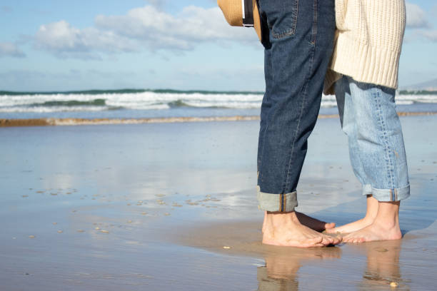 istock Caucasian couple spending time at seashore 1445020160