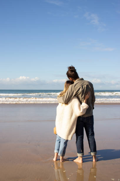 istock Romantic couple spending time at the beach 1445020215