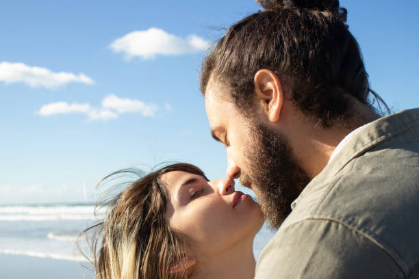 istock Passionate young couple spending time at seashore 1445020235