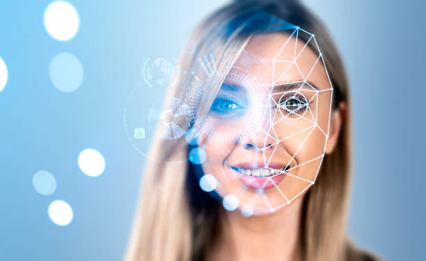 Smiling businesswoman with facial recognition, digital interface stock photo