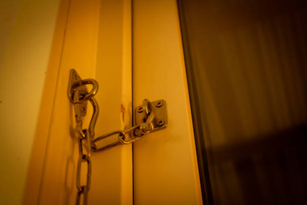 Old locked up padlock on white background