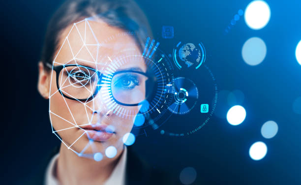istock Serious businesswoman with facial recognition, digital interface 1445022717