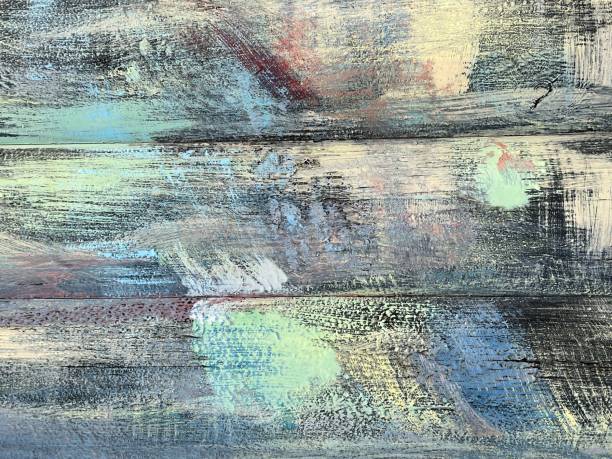 istock Colorful painted wooden cracked abstract background. 1445024215