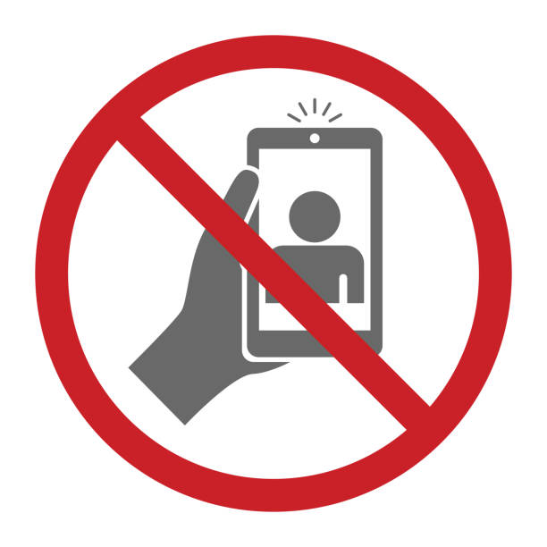 foto auf smartphone stoppen - cell phone ban stock-grafiken, -clipart, -cartoons und -symbole