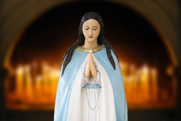 istock Mother Mary pray. Blessed virgin statue. Praying Virgin Mary statue. Religious background. Empty copy space faith background. 1445026332