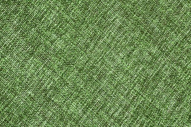 istock Green fabric texture. Closeup textile background. Apparel clothes. Casual wear. Knit pattern. Warm winter fiber material. 1445026694