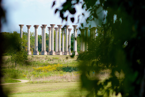 Washington, D.C., USA - September 10, 2016: View of the National Capitol Columns—twenty-two Corinthian columns which were originally from the United States Capitol—now located within the National Arboretum amid 20 acres of open meadow known as the Ellipse Meadow.