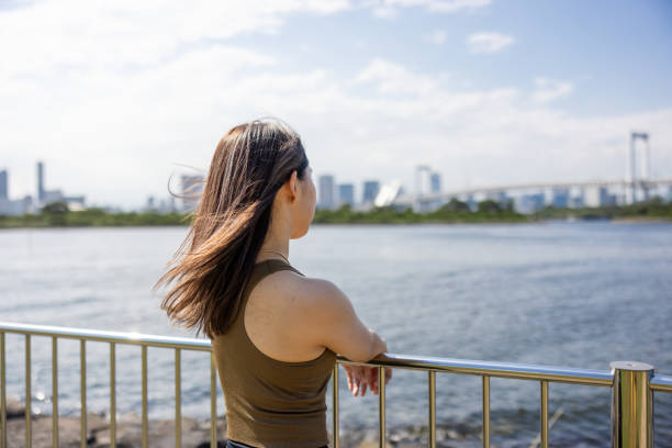 istock Female athlete looking at sea 1445029660